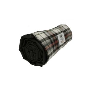 The Kinloch Anderson Picnic Rug in Panda Tartan with wax waterproof backing