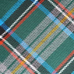 The Kinloch Anderson Picnic Rug in the Queen Elizabeth II Platinum Jubilee Tartan with wax waterproof backing