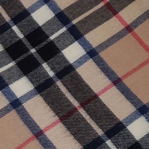 Lambswool throw in Camel Thomson Tartan Sett