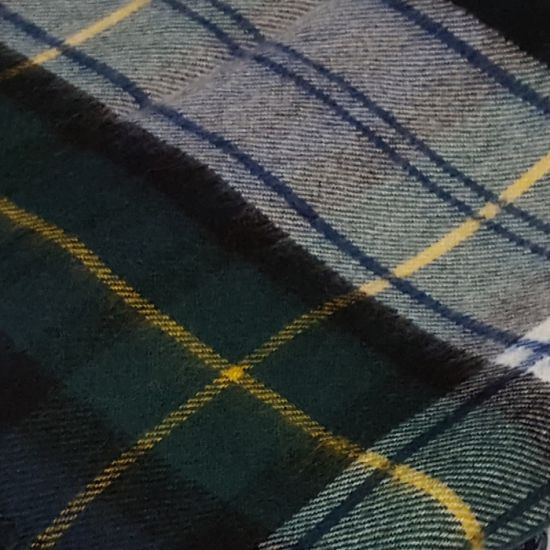 Lambswool throw rug in Gordon Dress Tartan Sett