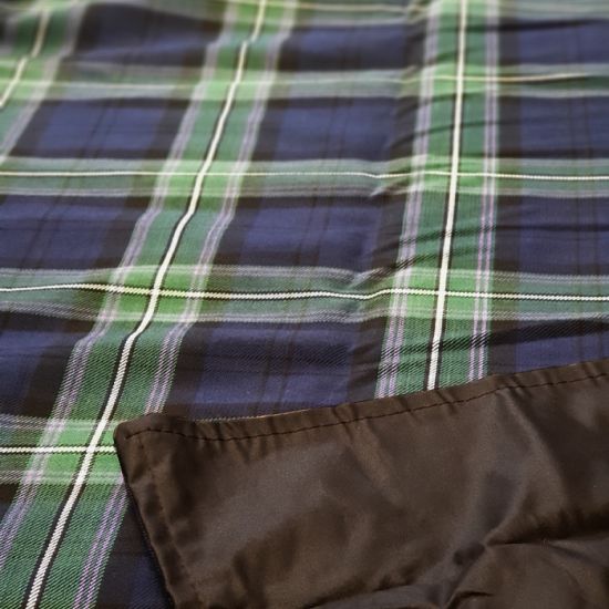 The Kinloch Anderson Picnic Rug in the Scottish Rugby Tartan with wax waterproof backing - As One