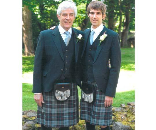 Father and Son proudly wear Kinloch Anderson Highland Dress outfits