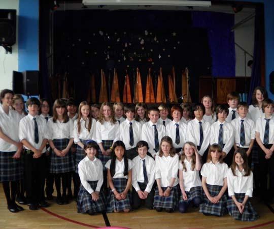 Tollcross Primary School perform at The Royal National Mod wearing Kinloch Anderson