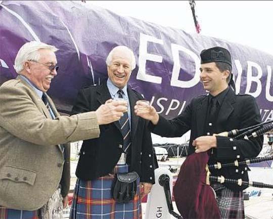 The Edinburgh Inspiring Capital's official Piper enjoys a dram wearing his Kinloch Anderson Kilt
